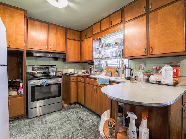 kitchen featuring white fridge, sink, stainless steel electric stove, and dark tile floors