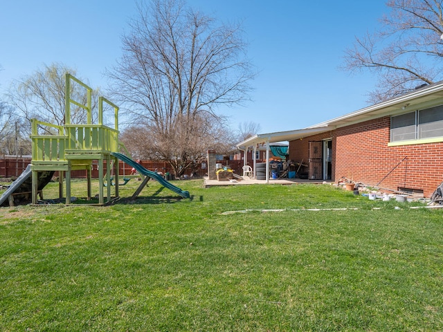 view of yard with a playground