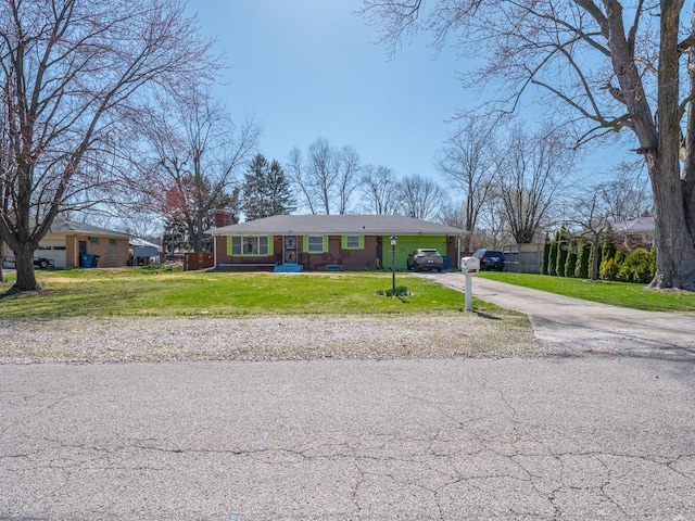 single story home with a front yard