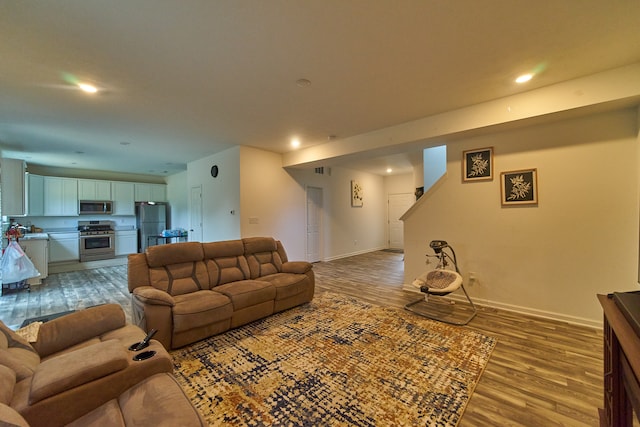 living room with wood-type flooring