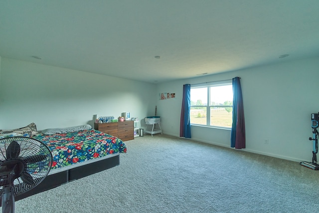 bedroom with light carpet