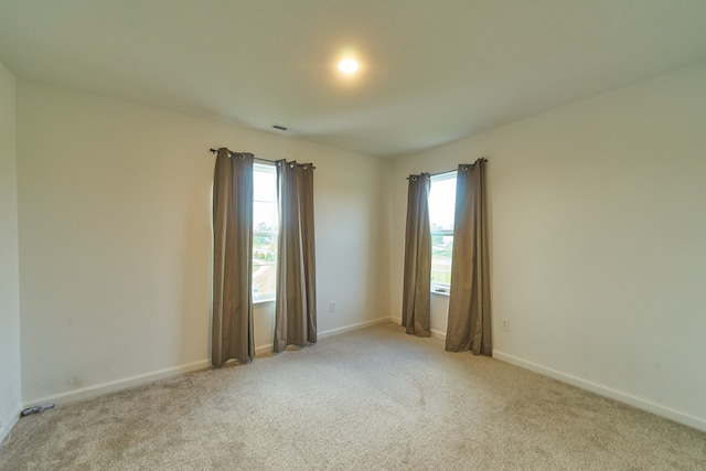 view of carpeted spare room