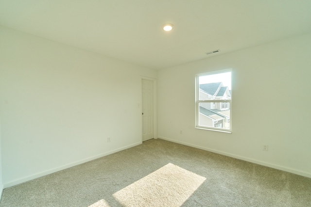 view of carpeted spare room