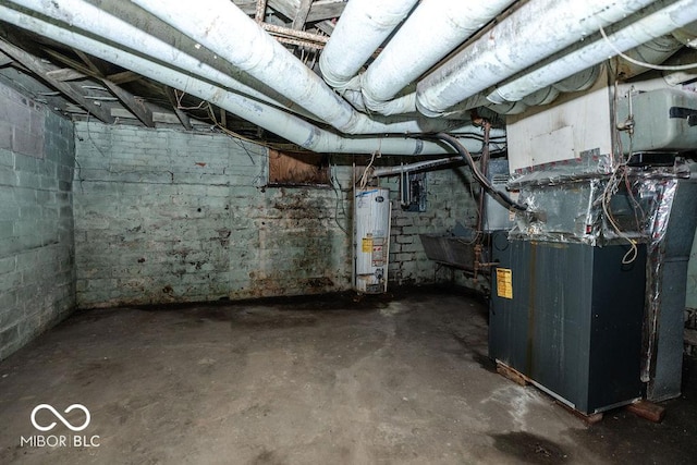 basement featuring water heater and heating unit