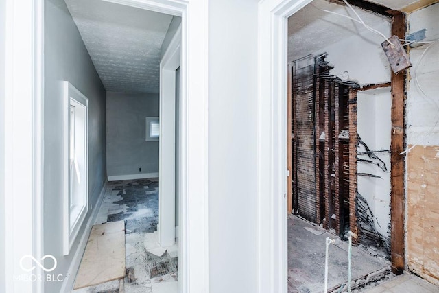 interior space featuring a textured ceiling