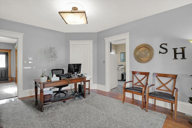 home office featuring hardwood / wood-style floors