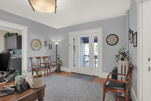 foyer with dark hardwood / wood-style flooring