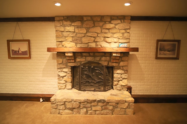 room details with a stone fireplace