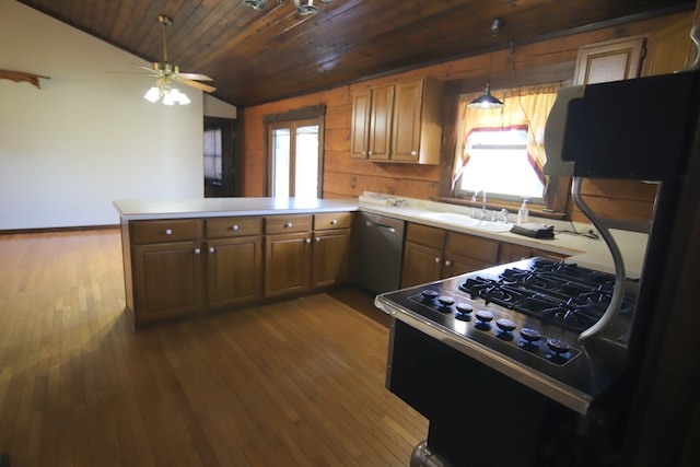 kitchen with wood ceiling, stainless steel dishwasher, ceiling fan, and a wealth of natural light