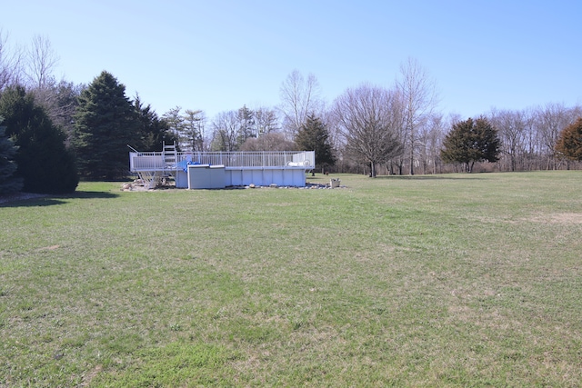 view of yard with a deck