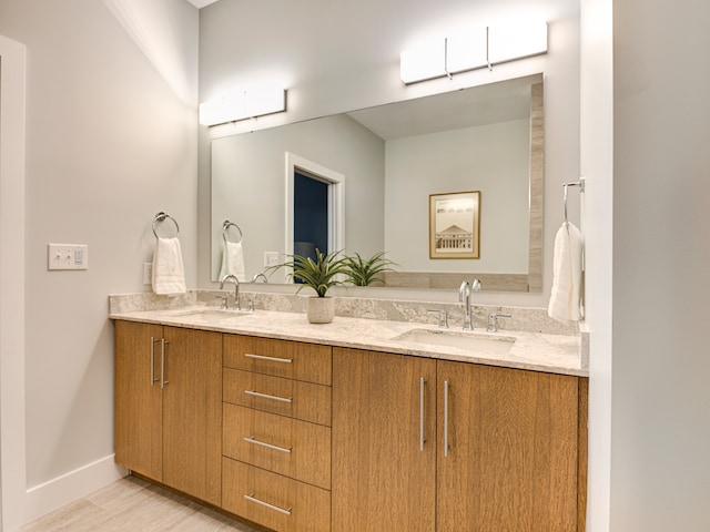 bathroom with dual vanity