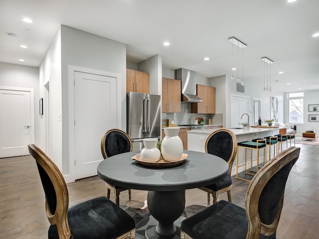 dining room featuring light wood-type flooring