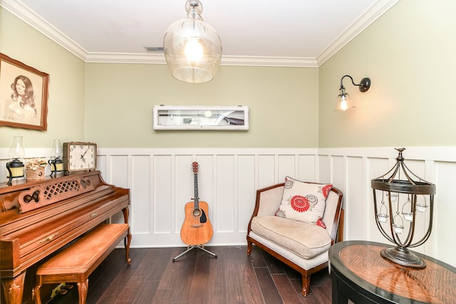 living area with crown molding and dark wood-type flooring