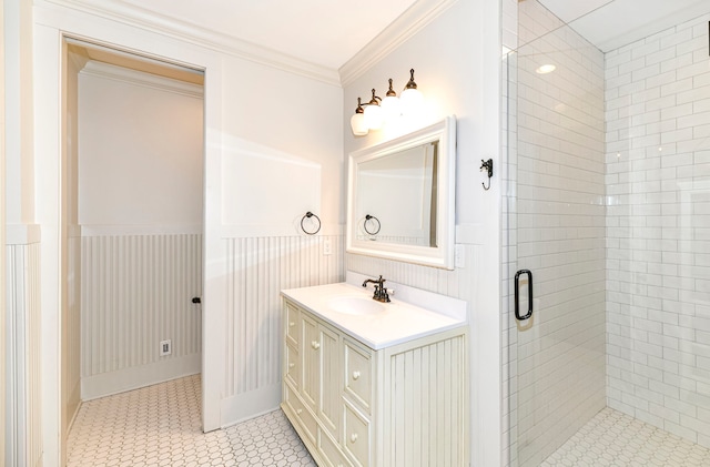 bathroom featuring vanity, tile floors, a shower with shower door, and ornamental molding