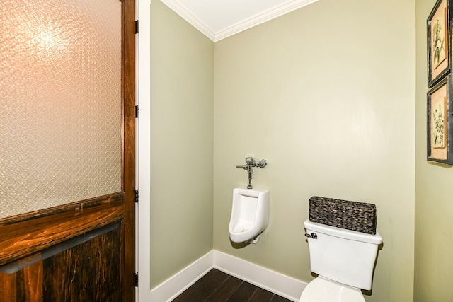 bathroom featuring toilet, wood-type flooring, and crown molding