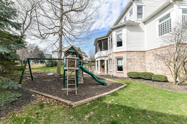 view of playground featuring a yard