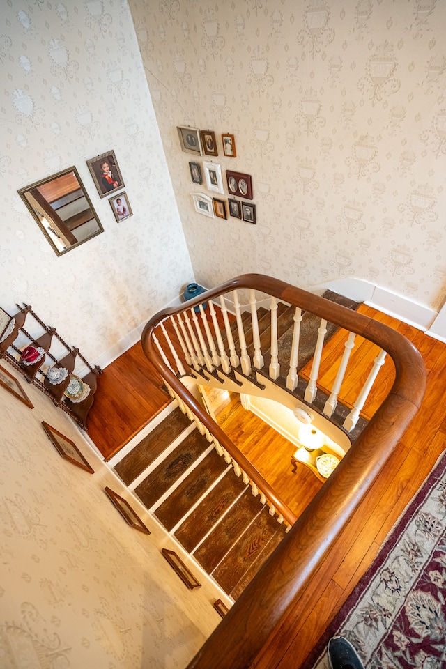 stairway with wood-type flooring