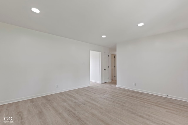 empty room with light wood-type flooring