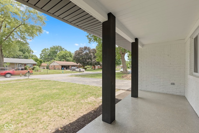 view of patio featuring a porch