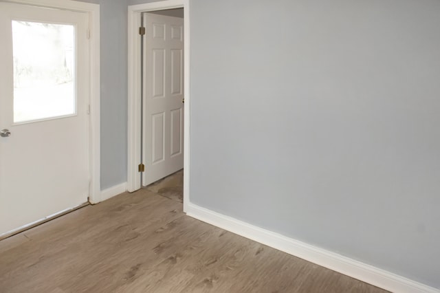 empty room with light wood-type flooring