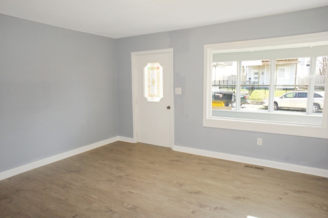 empty room featuring light hardwood / wood-style floors