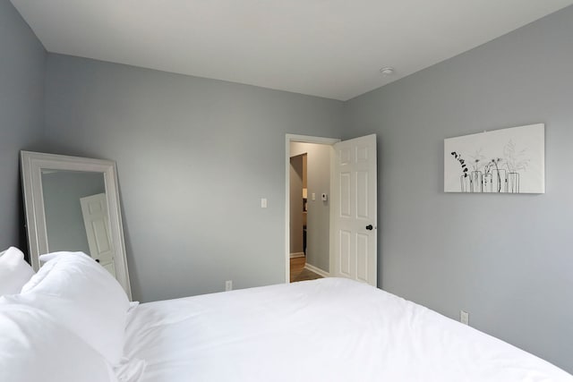 bedroom featuring wood-type flooring