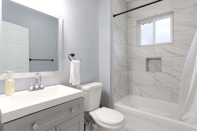 full bathroom featuring shower / bath combo with shower curtain, toilet, and vanity