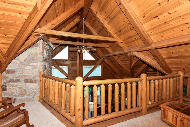 interior space with light carpet, wooden ceiling, and vaulted ceiling with beams