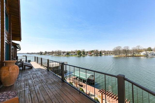 wooden terrace with a water view