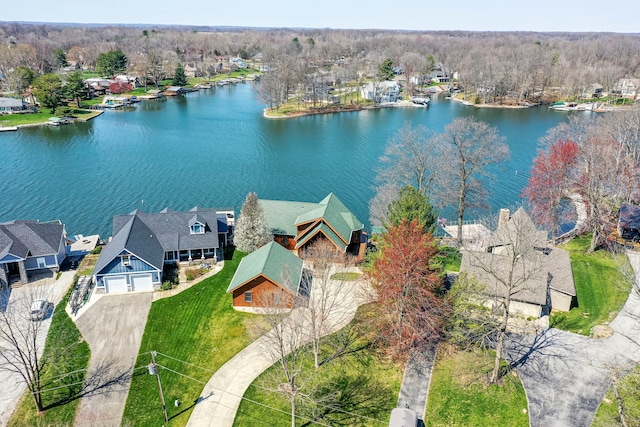 birds eye view of property featuring a water view