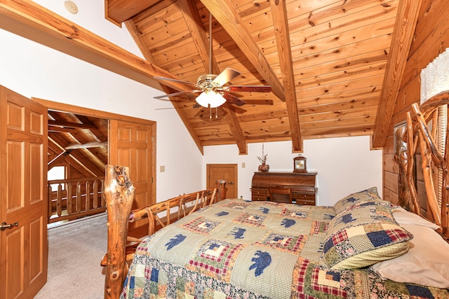 carpeted bedroom with ceiling fan, lofted ceiling with beams, and wooden ceiling