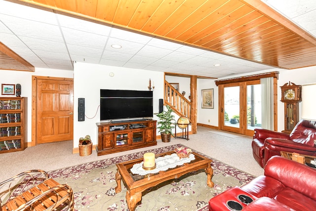 living room featuring light colored carpet and french doors