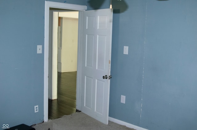 unfurnished bedroom featuring hardwood / wood-style flooring