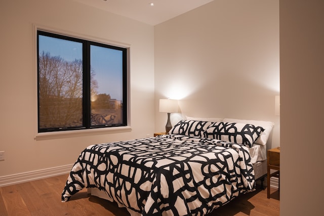 bedroom featuring light hardwood / wood-style floors