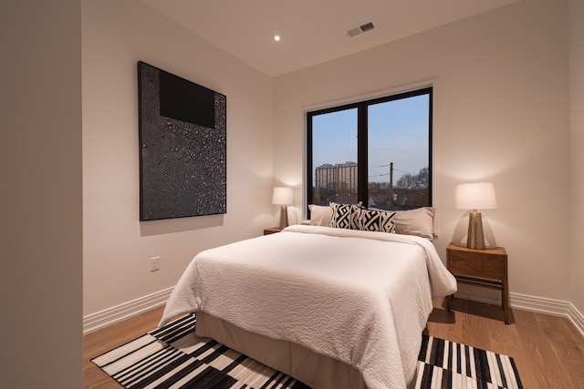 bedroom with light wood-type flooring