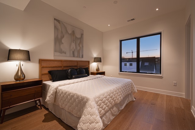 bedroom featuring light wood-type flooring