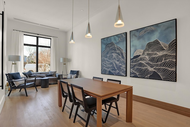 dining room with light hardwood / wood-style floors