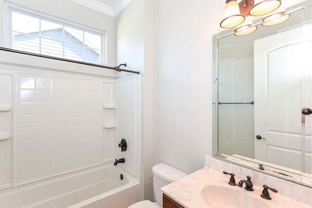 full bathroom with vanity, crown molding, toilet, and  shower combination