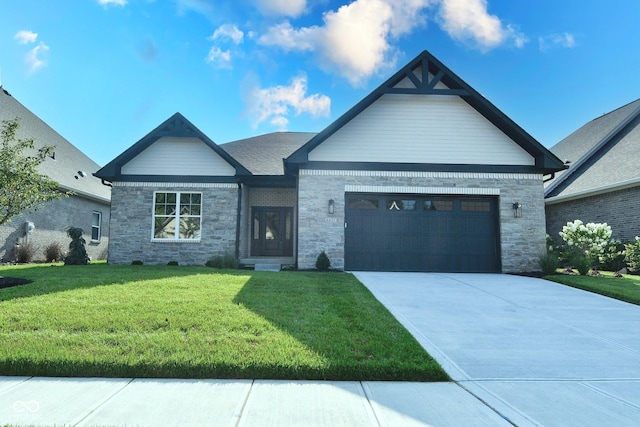 view of front facade featuring a front yard and a garage