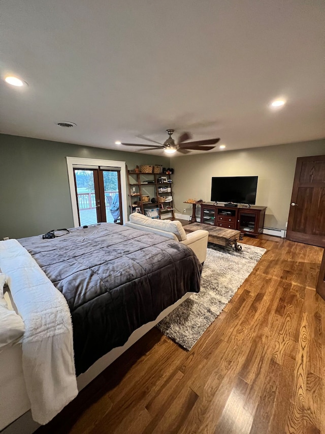 bedroom featuring dark hardwood / wood-style flooring, ceiling fan, access to exterior, and french doors