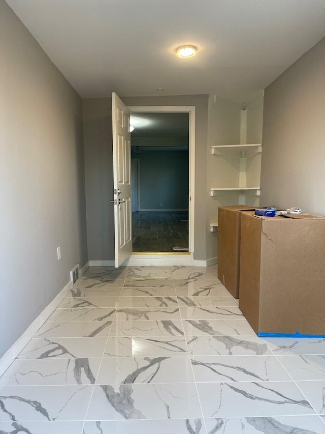 interior space featuring light tile floors