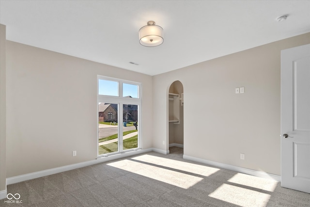 view of carpeted spare room