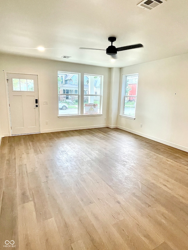 interior space featuring ceiling fan and light hardwood / wood-style floors