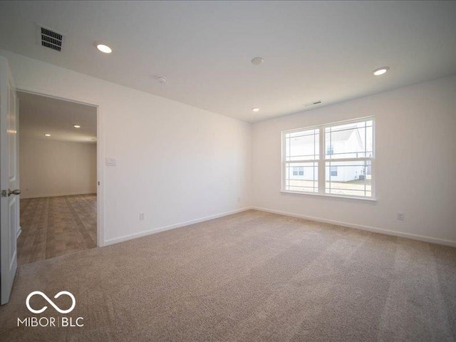 empty room featuring carpet floors