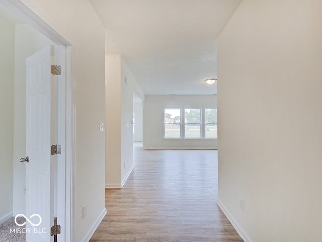 hall featuring light wood-type flooring