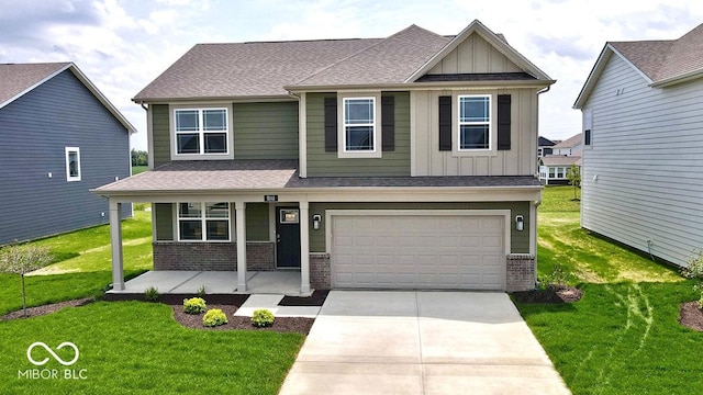 craftsman inspired home featuring a front yard, a garage, and a porch