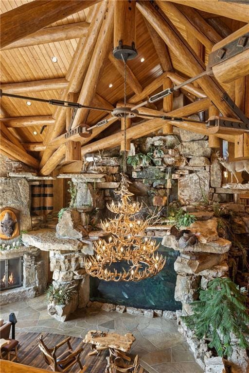 details with wood ceiling, a fireplace, and beam ceiling