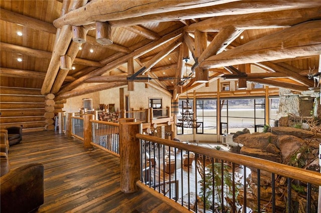 hall featuring lofted ceiling with beams, dark hardwood / wood-style flooring, rustic walls, and wood ceiling