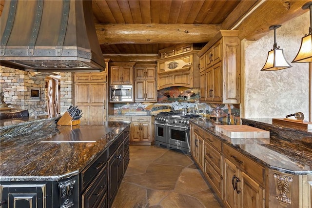 kitchen with beamed ceiling, fume extractor, dark stone countertops, and stainless steel appliances