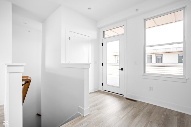 foyer featuring light wood-type flooring